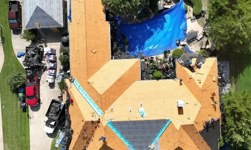 Professional Storm Damage Roof Repair being performed in Lake Grove